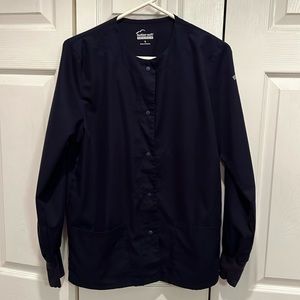 Women’s navy scrub jacket. Size small.